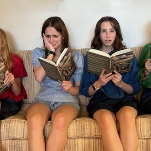 Cute photo of four of our five grandkids reading Pintsized Pioneers